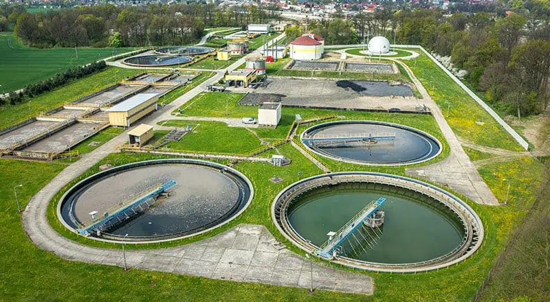 Water sewage treatment plant overhead view on a sunny spring day.