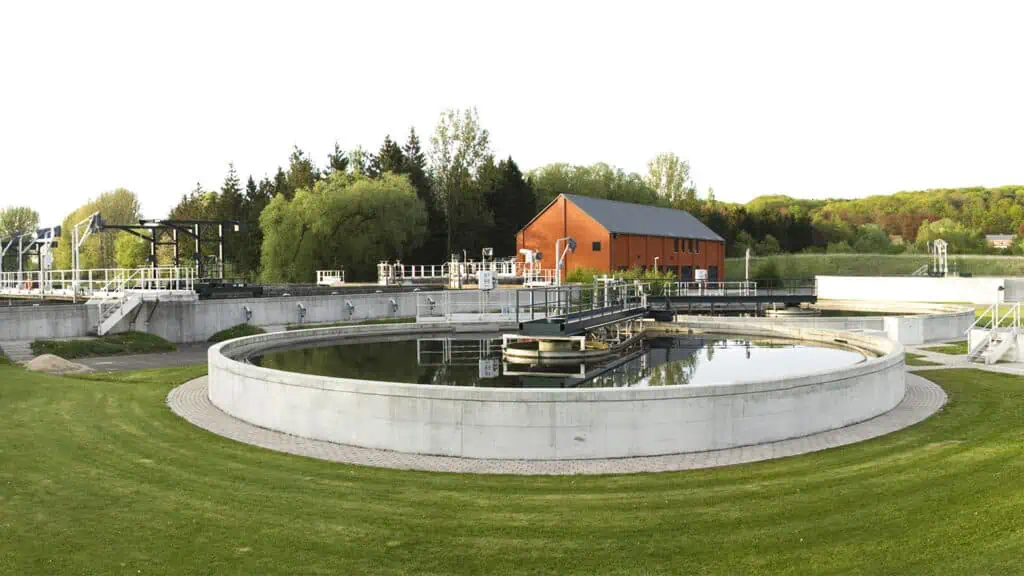 outside view of a water treatment plant with retention tanks